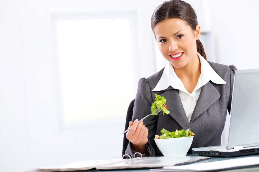 Business woman eating salad_iStock_000014935246Small