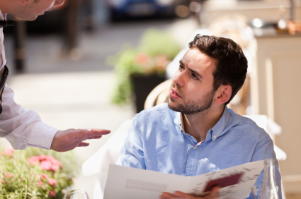 young_man_in_restaurant_cafe_iStock_000016631807XSmall