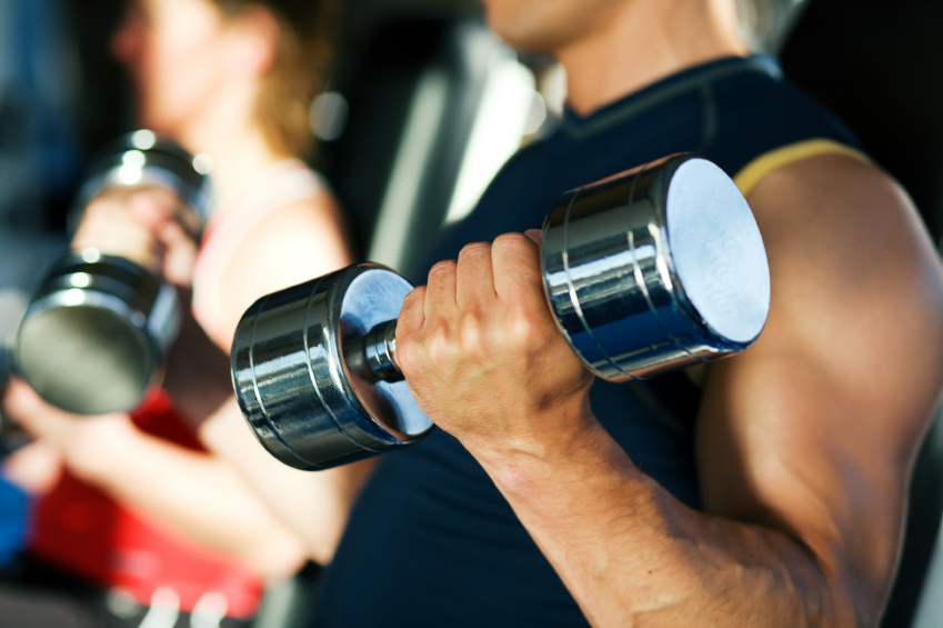 Man dumbells bicep_iStock_000005289475Small