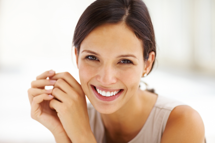 Gorgeous young female smiling confidently