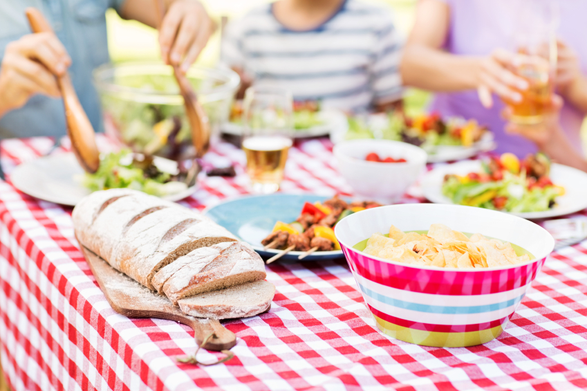 Family Having Lunch At Outdoors