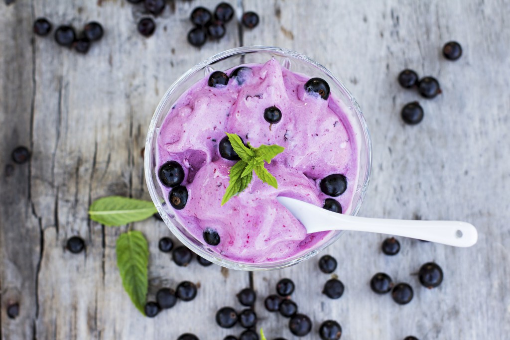 blackcurrant ice cream on the old table