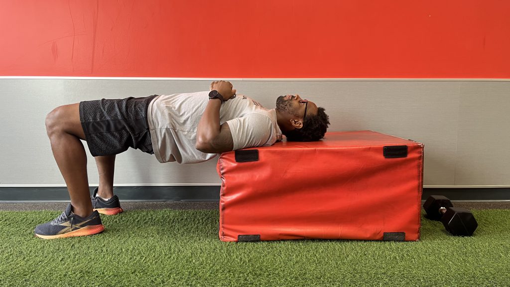 unweighted glute bridge on plyo box